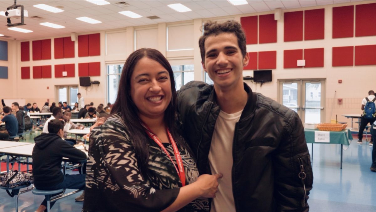 Ms.-Burgos-Principal-with-Ahmed-in-Lunch-Room.jpg