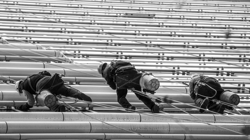 High-Rise Construction Teams Plan Fall Protection